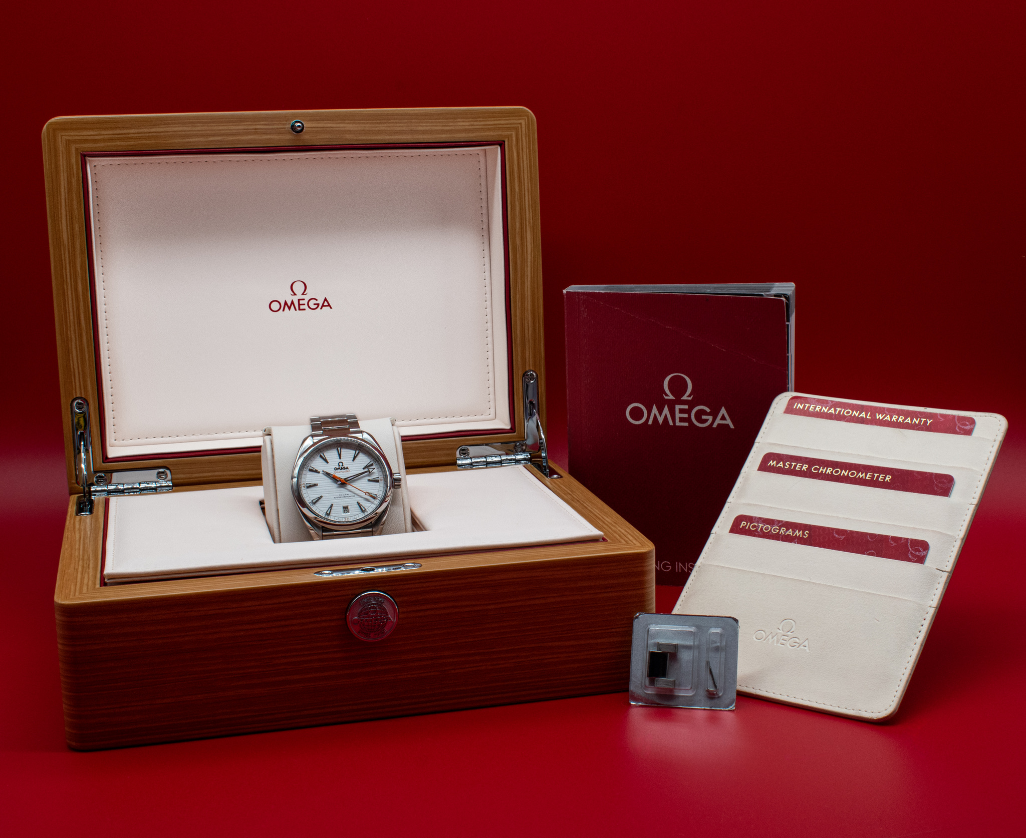 2024 Omega Seamaster Aqua Terra 220.10.41.21.02.001 complete set with watch, presentation box, booklet, cards, and spare links